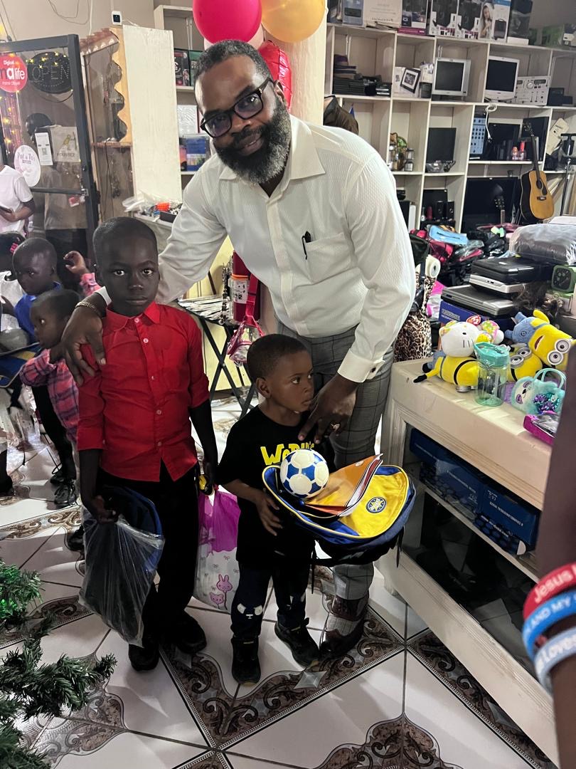 Children with new school supplies at the SCH gift event