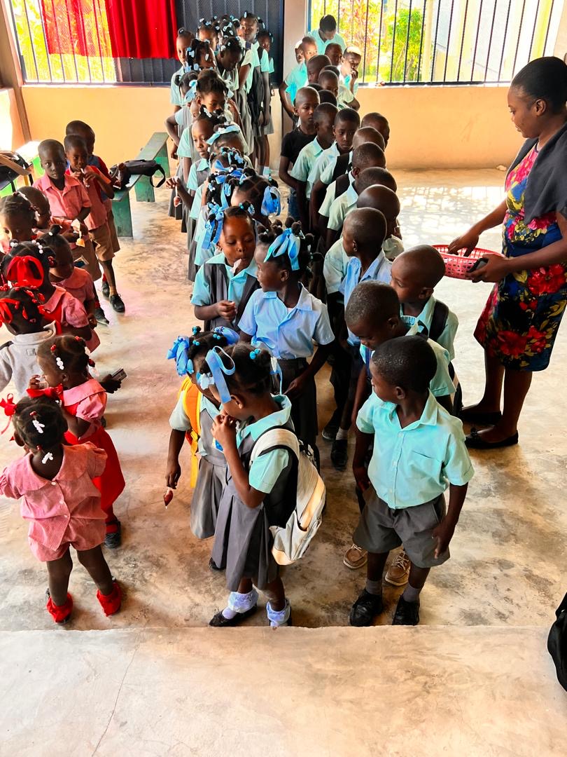 Students lined up inside the school for morning routine